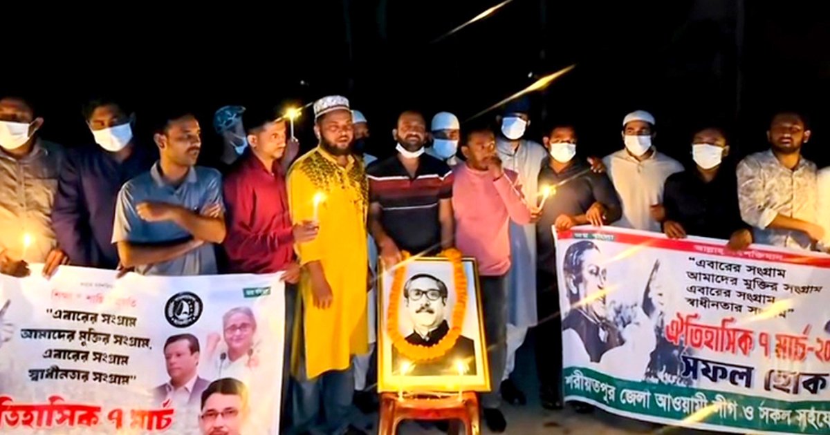 মধ্যরাতে মোমবাতি প্রজ্জ্বলন করে শেখ মুজিবের প্রতি শ্রদ্ধা