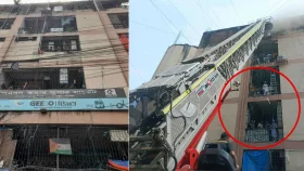 মাইকে ঘোষণার পরও ভবন থেকে নামেনি অনেকেই, বাইরে উৎসুক জনতার ভিড়