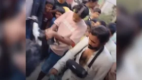 মাথার চুল কেটে গলায় ঝুলানো সাউন্ডবক্সে গান, নাচতে বাধ্য করা হলো ২ তরুণকে
