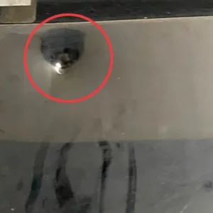 ৫০ লাখ টাকা চাঁদা না পেয়ে প্রবাসী ব্যবসায়ীর ভবনের গেটে গুলি