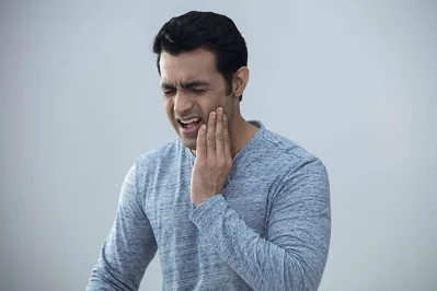 মিষ্টিজাতীয় খাবার থেকে তৈরি হওয়া অ্যাসিড দাঁতের এনামেল ক্ষয়ের জন্য দায়ী
