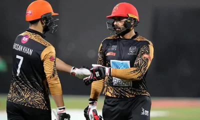 ছেলে হাসান খানের সঙ্গে মোহাম্মদ নবী