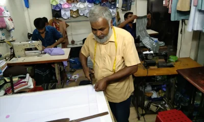 গুডফিড টেইলার্সের মালিক শহিদুল ইসলাম পোশাক তৈরিতে ব্যস্ত সময় পার করছেন। ছবি- ইত্তেফাক 