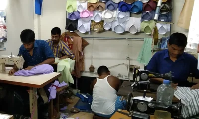 পোশাক তৈরিতে ব্যস্ত সময় পার করছেন দিনাজপুরের ফুলবাড়ীর দর্জিপাড়ার কারিগররা। ছবি- ইত্তেফাক