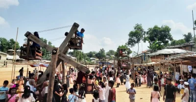 ক্যাম্পে নাগরদোলায় চড়ে রোহিঙ্গা শিশুদের ঈদ উদযাপন। ছবি: সংগৃহীত
