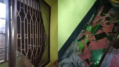 বিফোরণে একটি বাড়ির জানালার কাচ ভেড়ে যায়। ছবি: সংগৃহীত