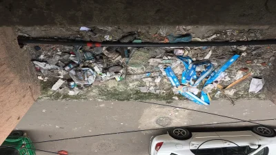 রাজউক ভবনের সানসেডে ফেনসিডিলের খালি বোতলের স্তুপ