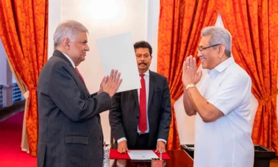 ডানে গোটাবায়া রাজাপাকসে, বাঁয়ে রনিল বিক্রমাসিংসে।