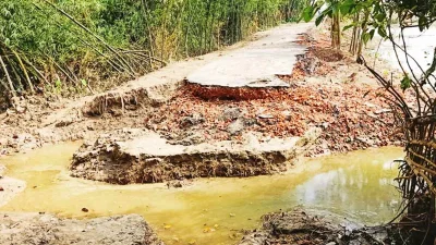 রাস্তা ভেঙে ডোবায় পরিণত