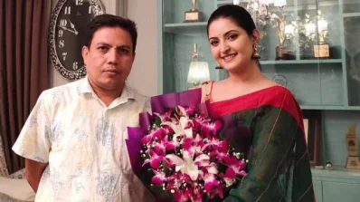 নির্মাতা অরণ্য আনোয়ার ও পরীমণি। 