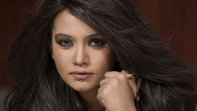 কণ্ঠশিল্পী মিলা। 