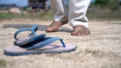 বাইরে থেকে জুতা খুলে তারপর গ্রামে প্রবেশ করতে হয়