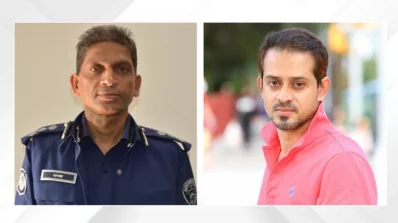 বামে পিবিআই) প্রধান বনজ কুমার মজুমদারের, ডানে সাংবাদিক ইলিয়াস হোসাইন