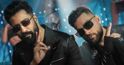 ভিকি কৌশলের সঙ্গে গায়ক করণ আউজলা। ছবি: সংগৃহীত