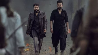 ‘এল টু: এমপুরান’ সিনেমার দৃশ্যে মোহনলাল ও পৃথ্বীরাজ। ছবি: সংগৃহীত