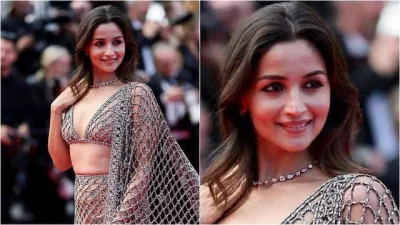 গলায় থাকা নেকলেস পরে যেতে নিলে যথাস্থানে চেপে রেখে ঘাড়ে হাত দিয়ে পোজ দেন আলিয়া
