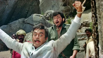 &lsquo;শোলে&rsquo; সিনেমার দৃশ্যে সঞ্জীব কুমার ও আমজাদ খান। ছবি: সংগৃহীত